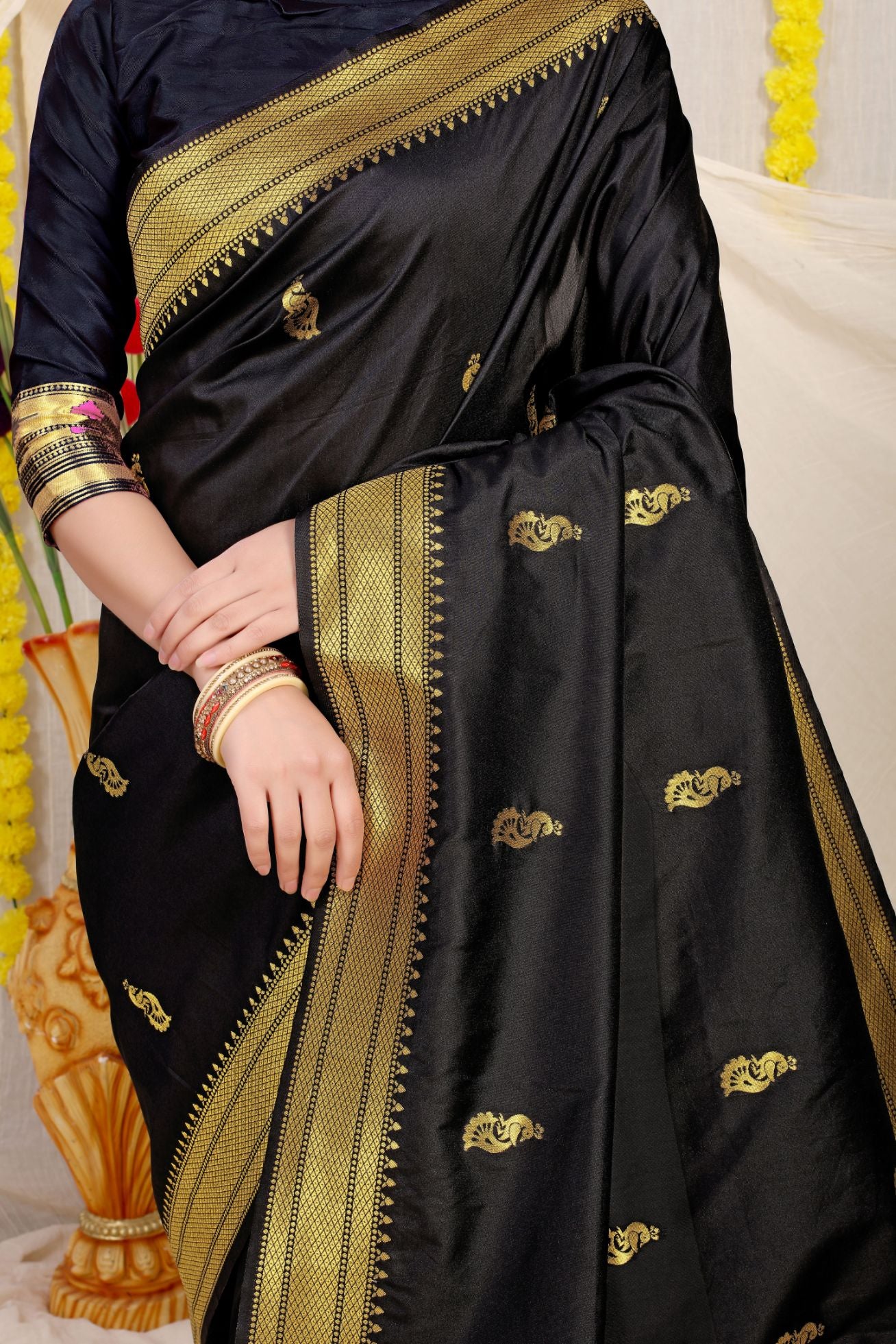 black classic paithani saree with zariweavingwork looking great