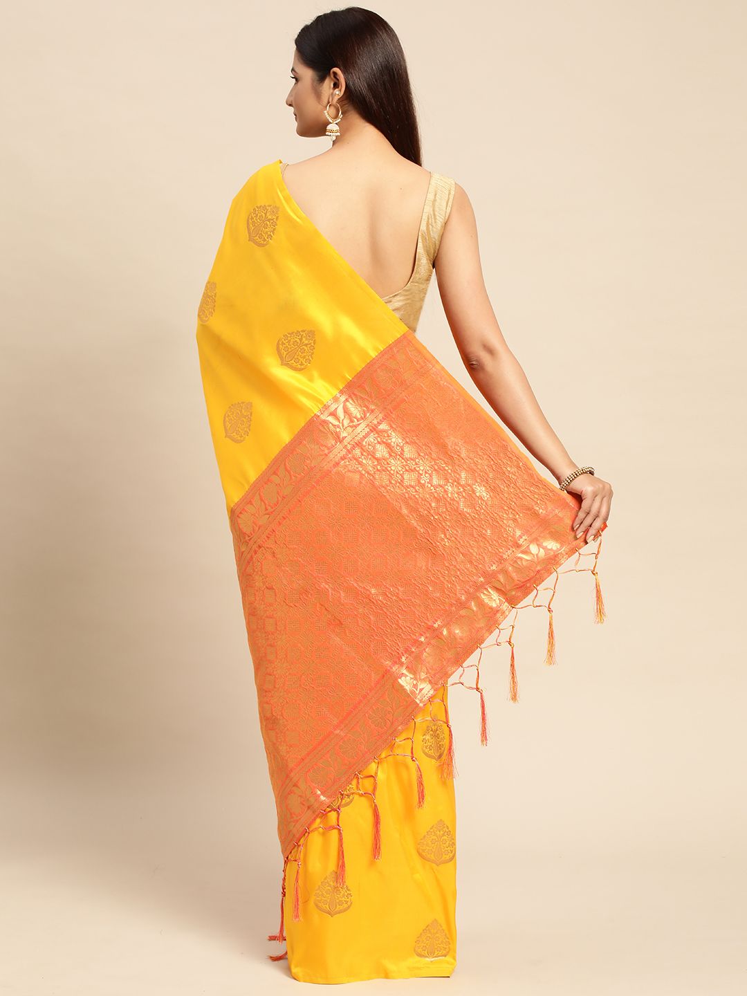 Yellow Traditional banarasi saree looking good