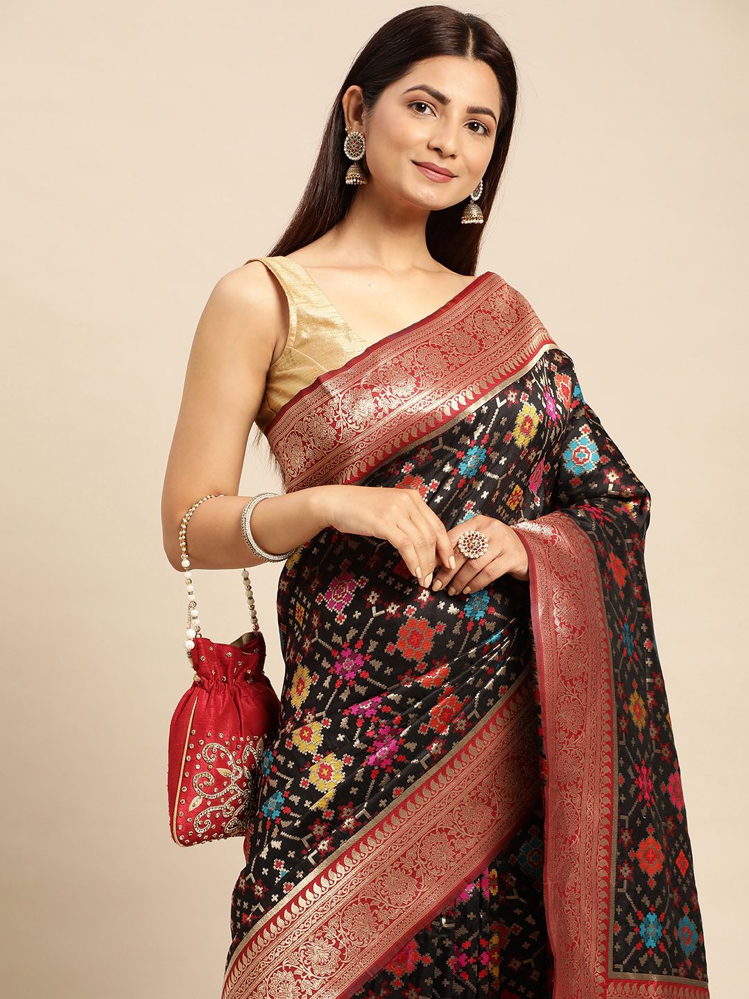 Black color banarasi weaving patola saree with brilliant look