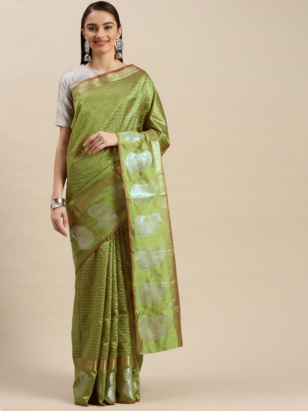 Pista Green color  linen silk saree gold and silver zari weaving work with rich pallu