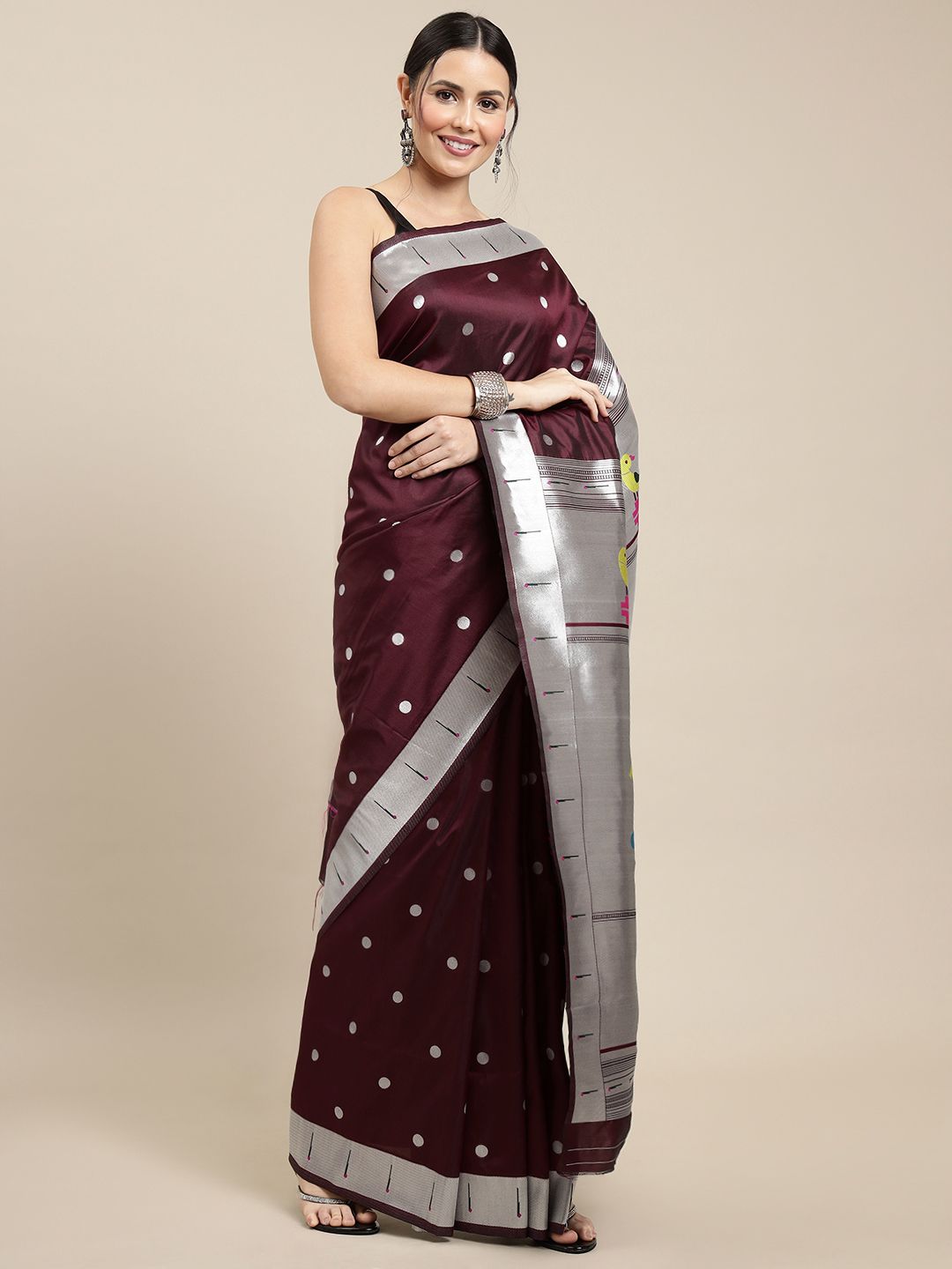 This bright burgundy Banarasi silk saree from Kankatala, with silver zari  motifs of Kadwa weave flying birds, looks stunn… | Saree look, Saree,  Indian designer wear