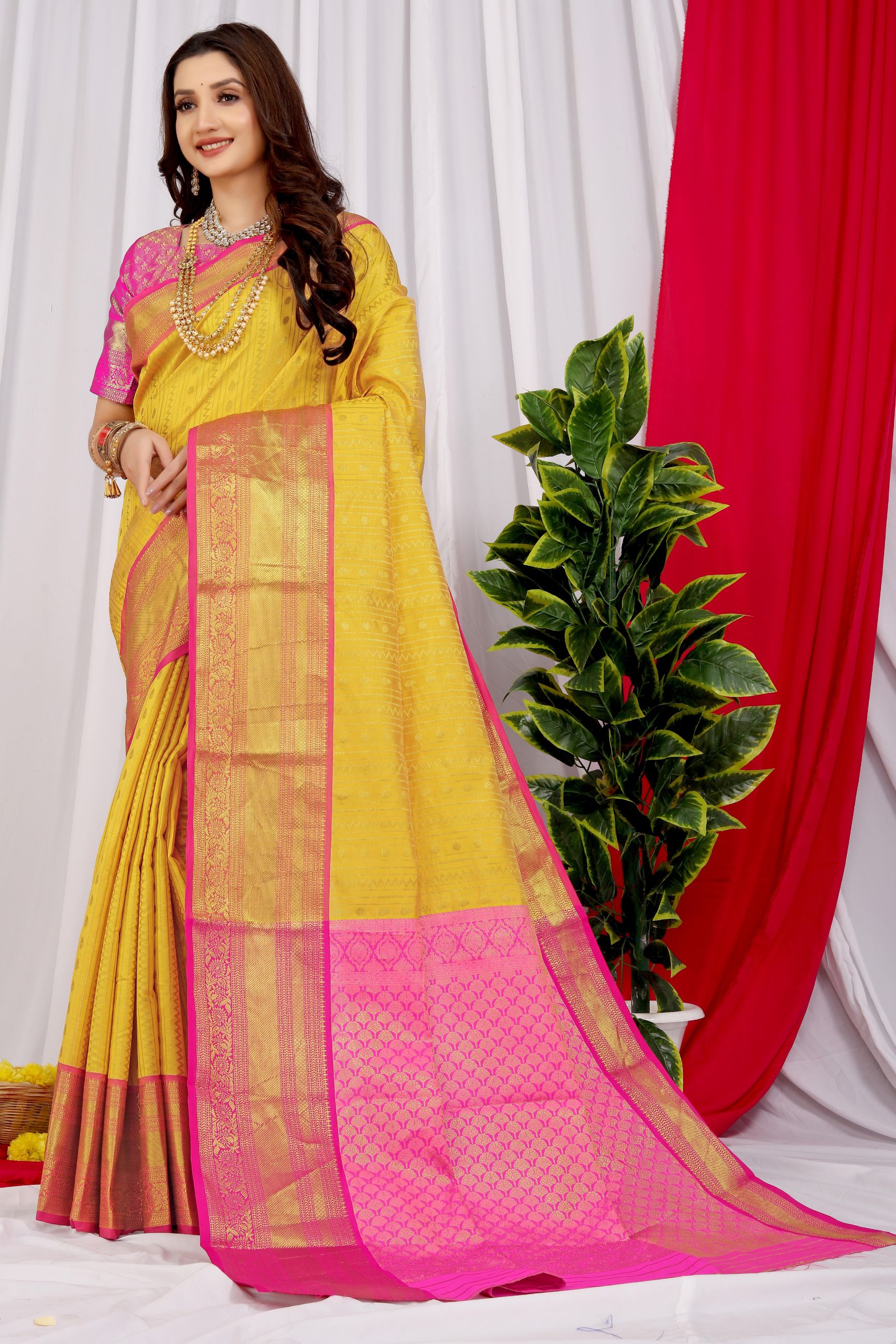 Yellow color Designer kanchipuram pattu silk saree With gold zari weaving work and contrast blouse