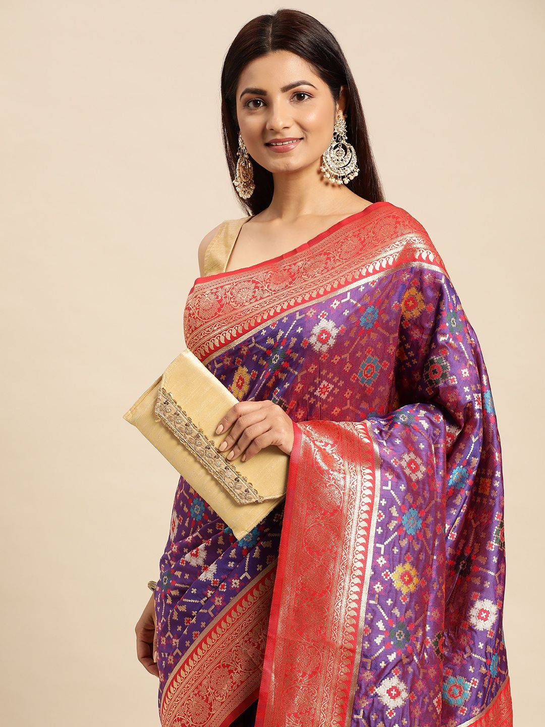 Purple color banarasi weaving patola saree with brilliant look