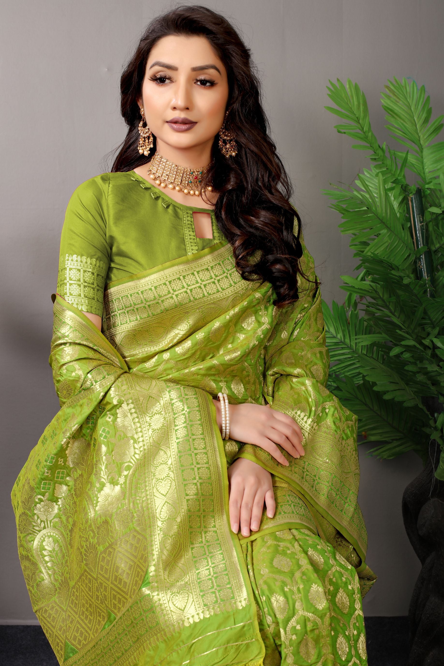 pista green banarasi silk saree with golden zari weaving work