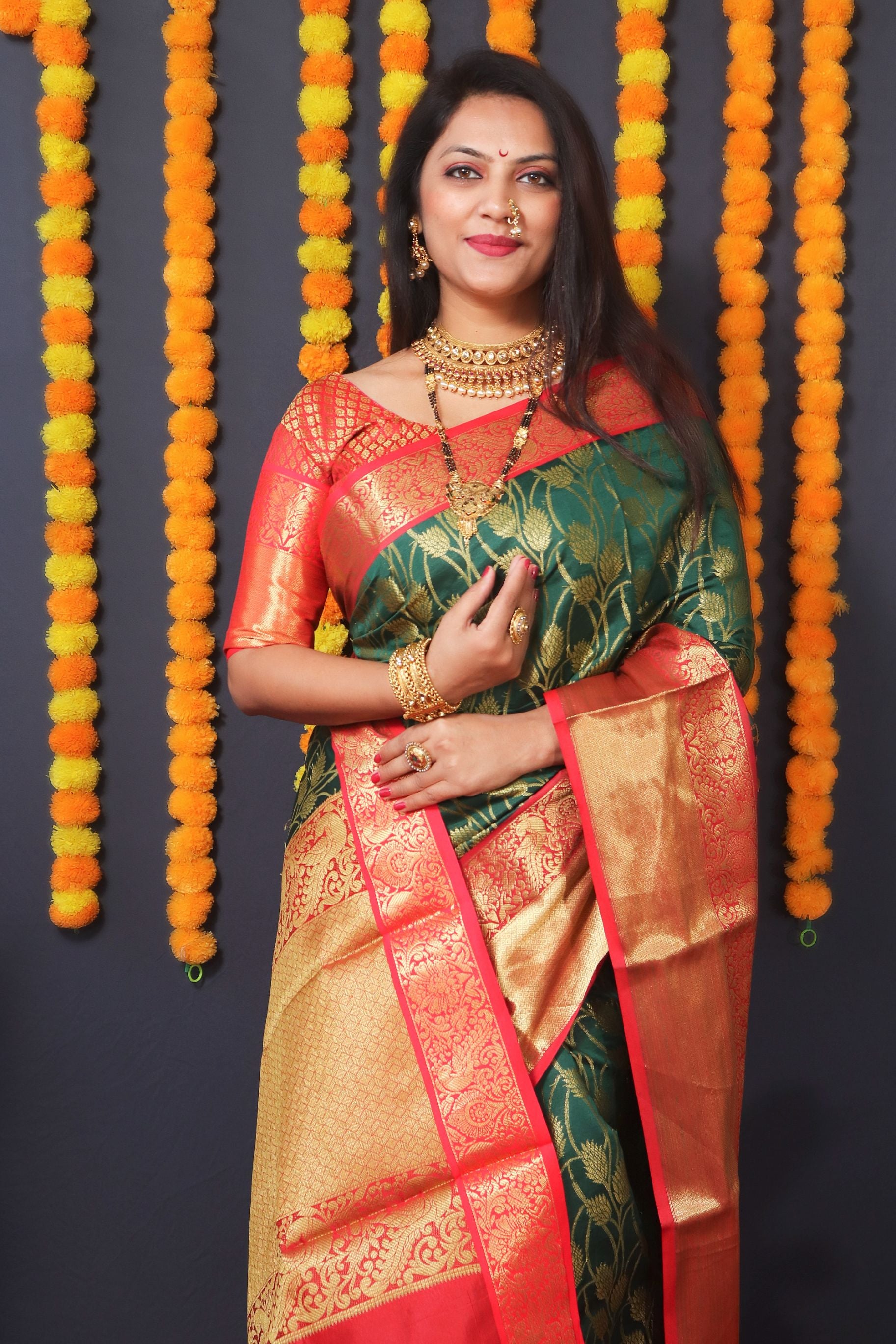 Green color kanchipuram south silk saree and gold zari weaving with contrast bodar and contrast blouse
