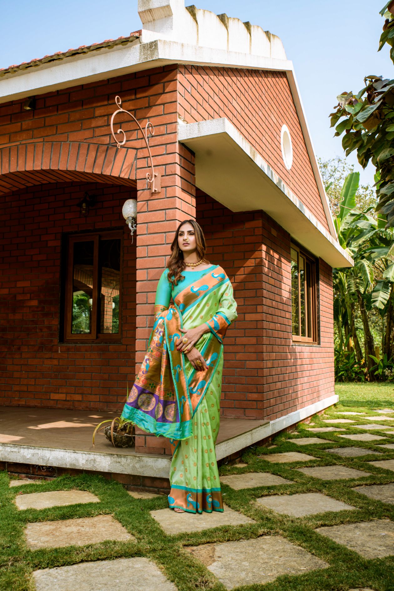 Pista Green Toned Embellished Paithani Silk Sarees