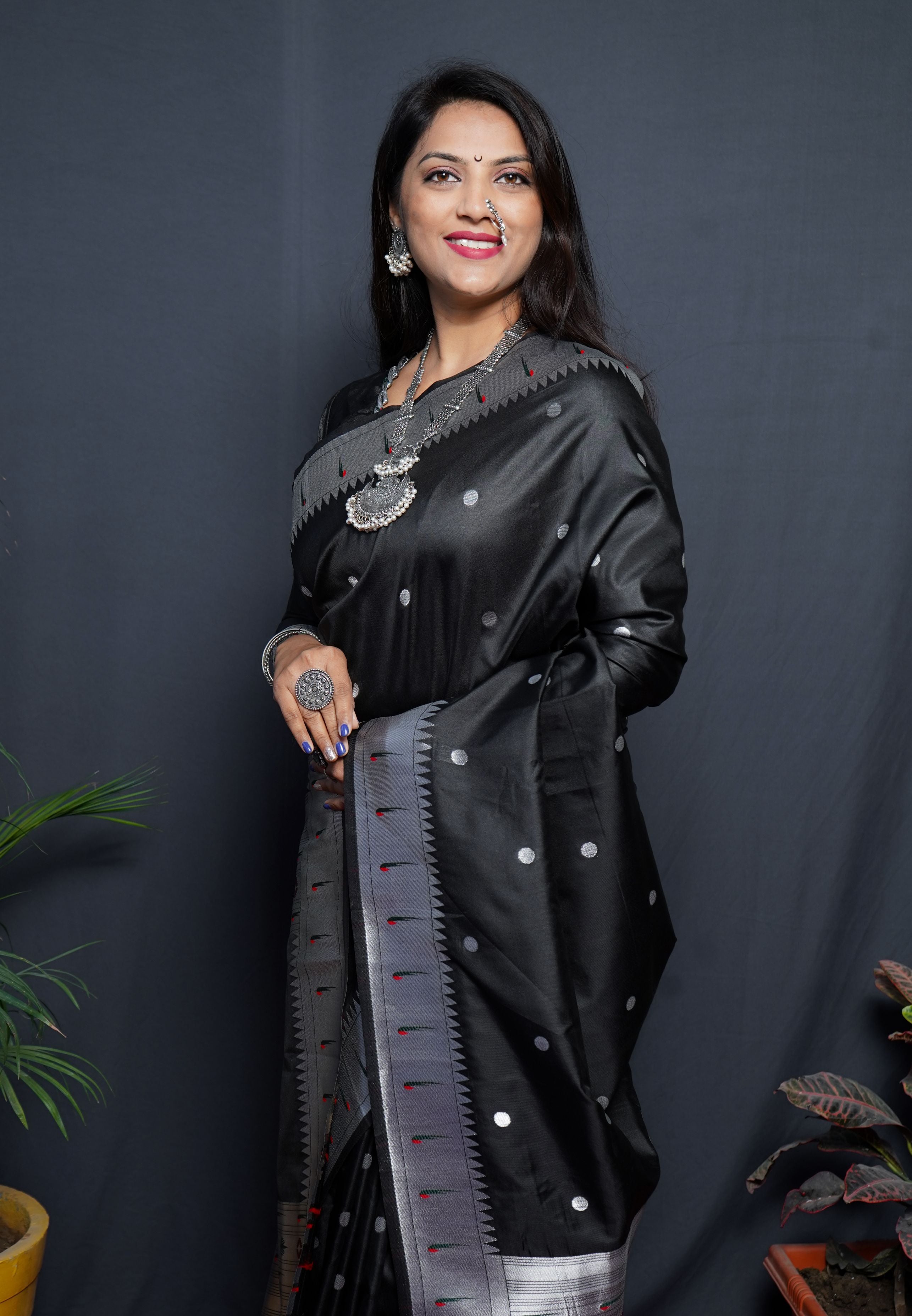 Black color pure paithani silk saree with muniya bodar and beautiful Silver and meenakari nath pallu and blouse pis