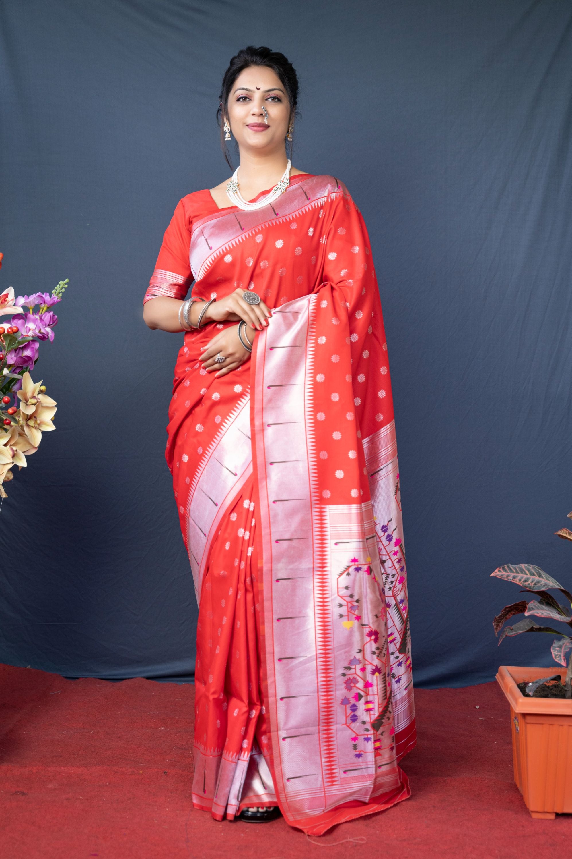 Red color pure paithani silk saree with Muniya boder and silver zari weaving work saree