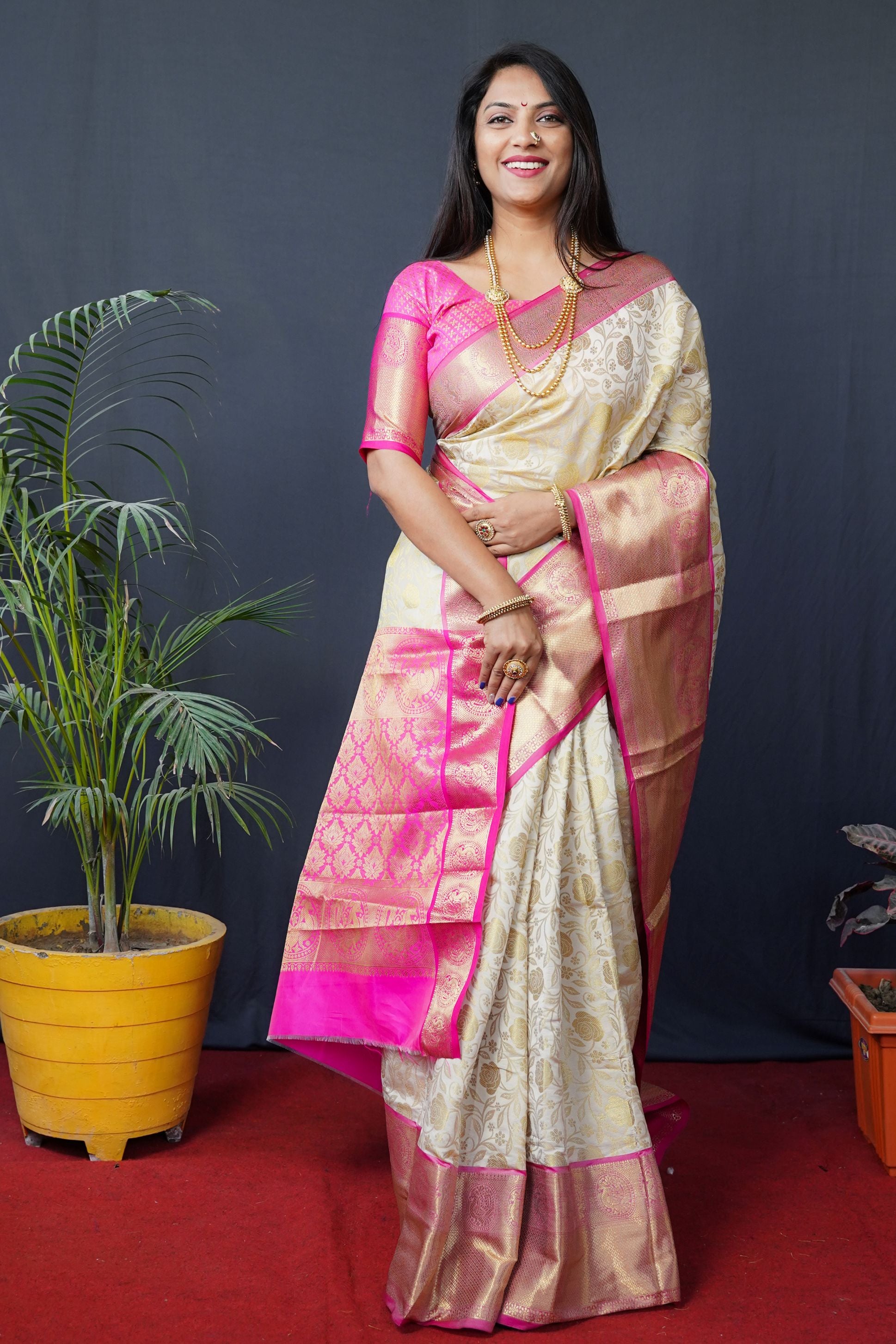 White color south pattu kanchipuram silk gold zari weaving work saree with contrast bodar and pallu