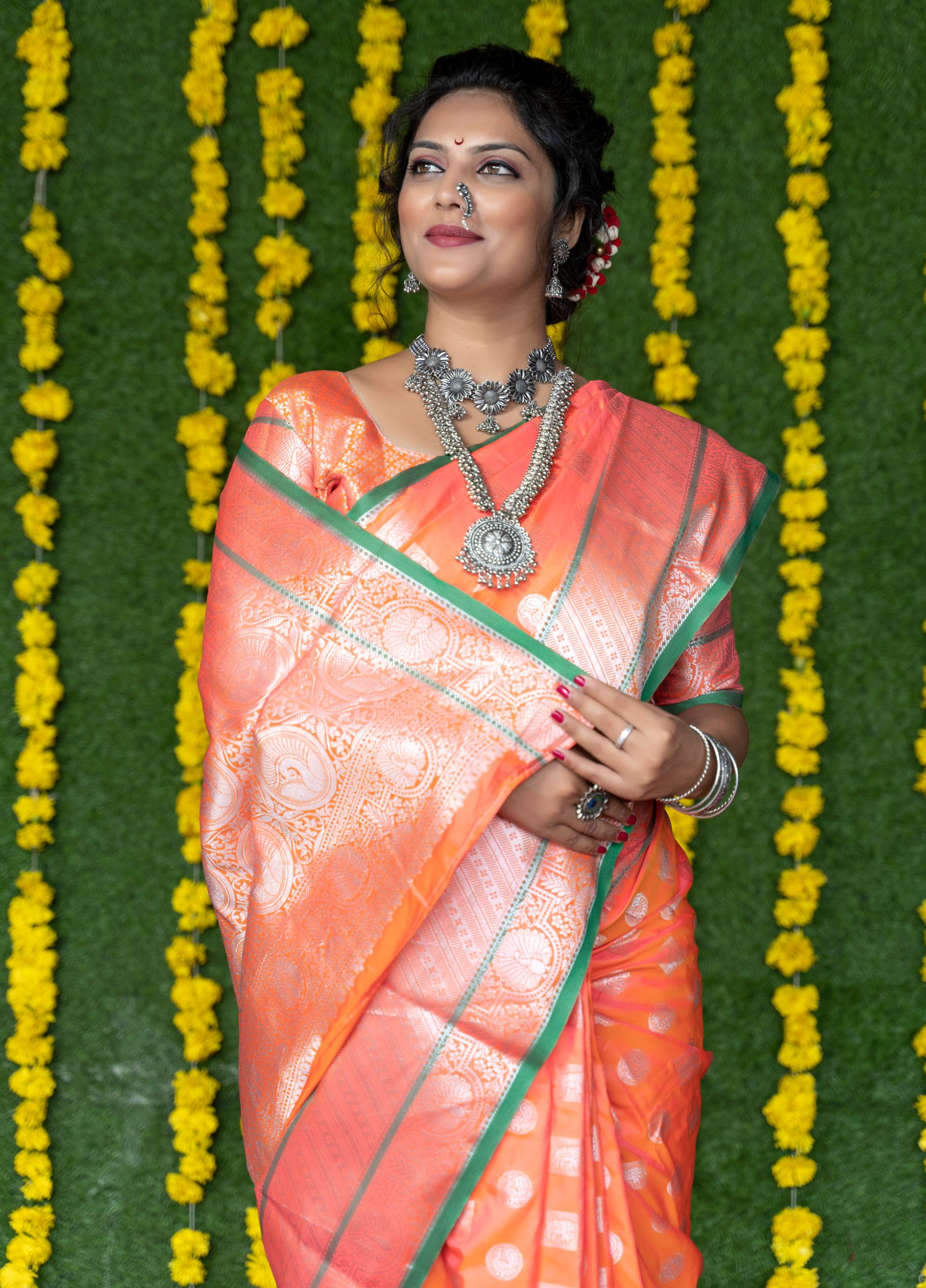 Orange color handloom designer kanjivaram silk saree with silver zari weaving work and blouse