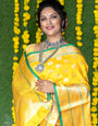 Yellow color handloom designer kanjivaram silk saree with silver zari weaving work and blouse