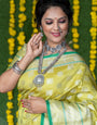Pista green color handloom designer kanjivaram silk saree with silver zari weaving work and blouse