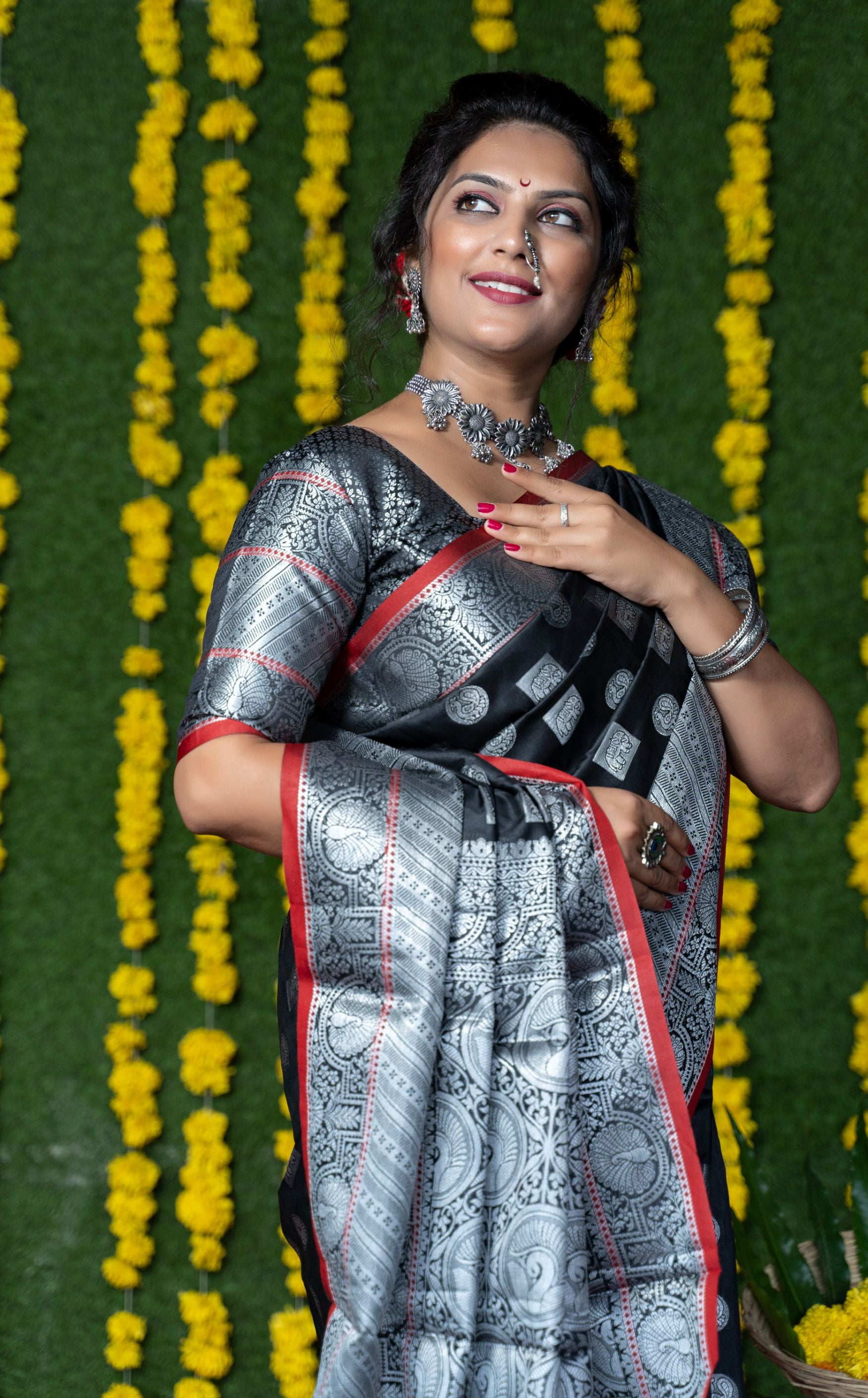 Black color handloom designer kanjivaram silk saree with silver zari weaving work and blouse