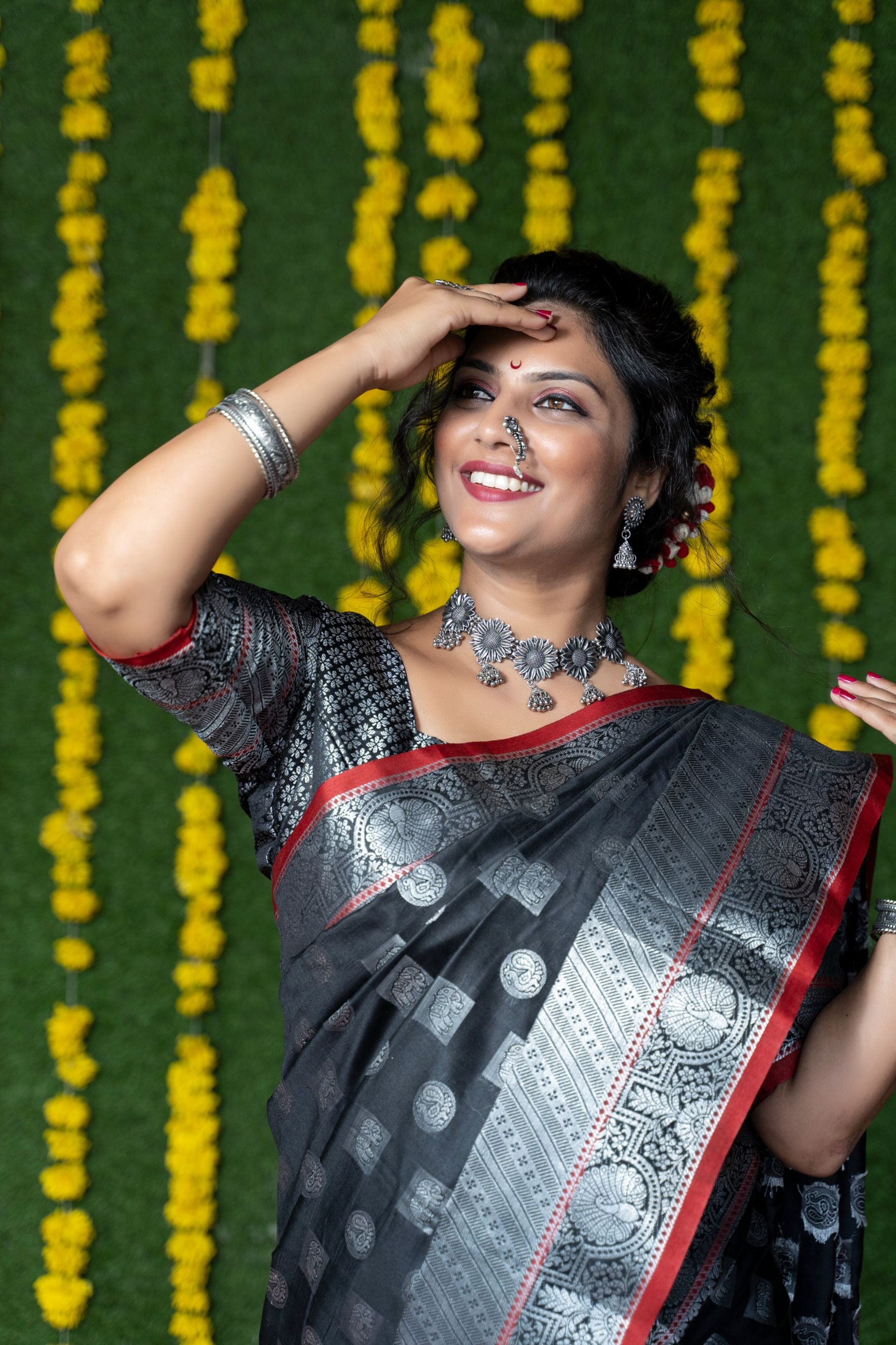 Black color handloom designer kanjivaram silk saree with silver zari weaving work and blouse