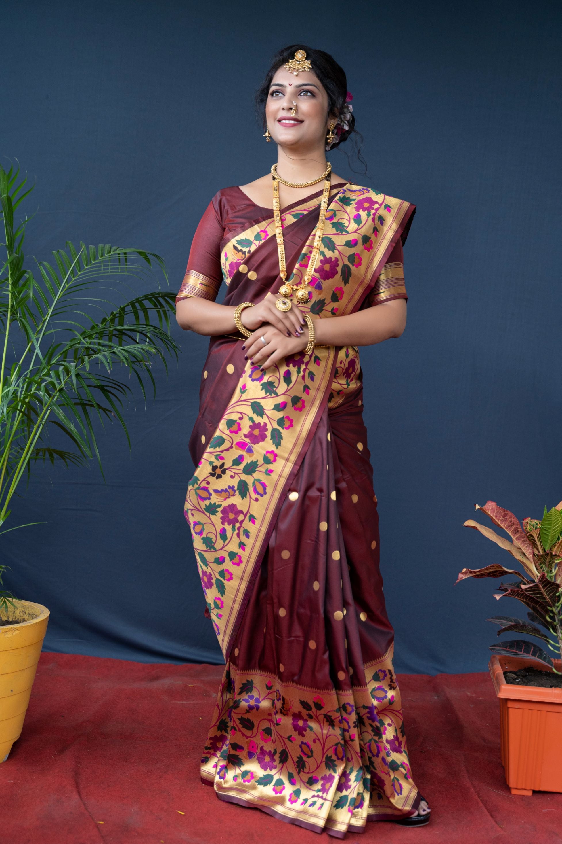 Maroon color pure paithani silk saree with designer meenakri weaving bodar and butiful pallu