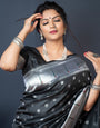 Black color pure paithani silk saree with Muniya boder and silver zari weaving work saree