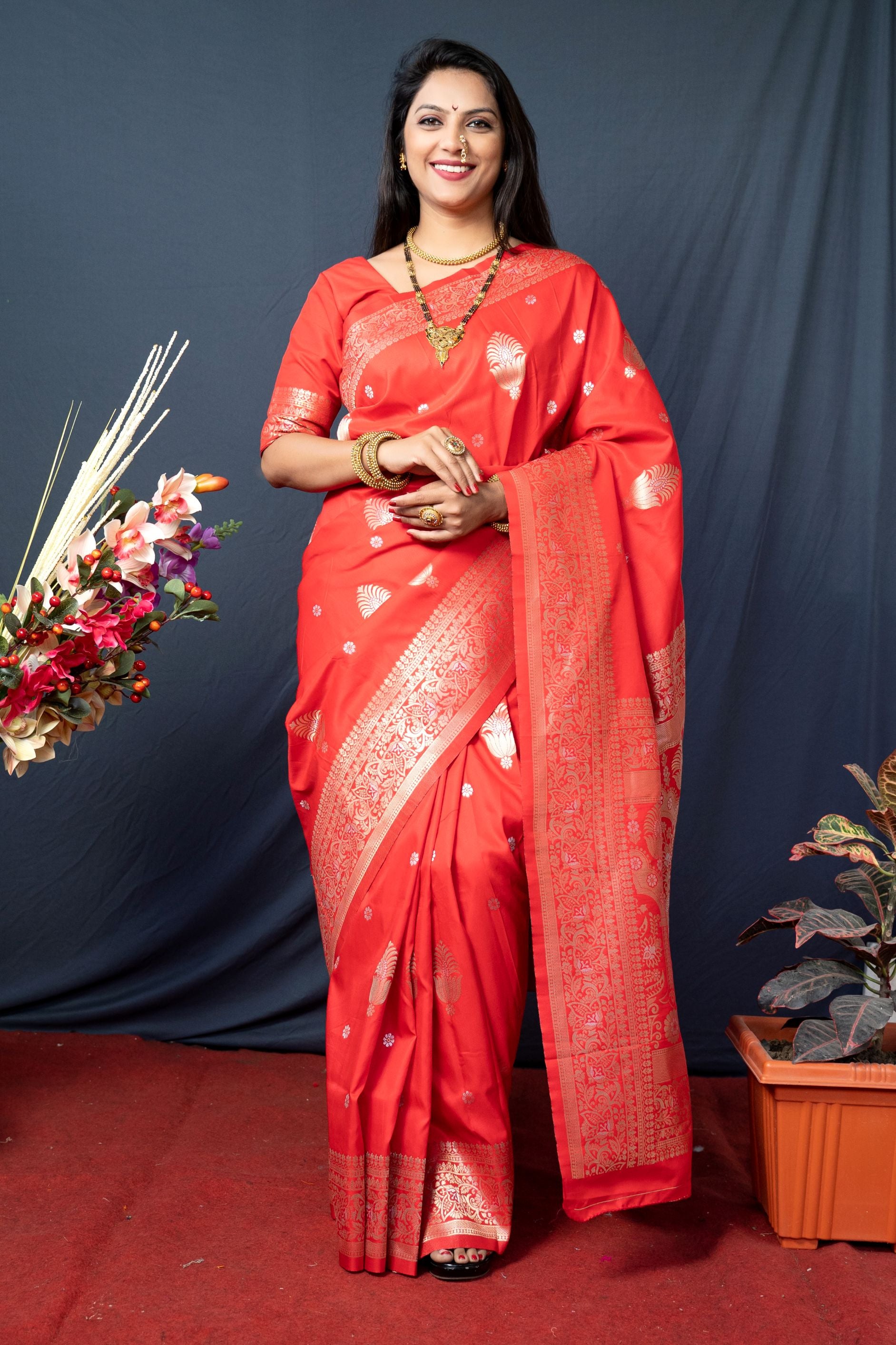 Red color banarasi silk saree with designer silver and gold weaving work and blouse pis